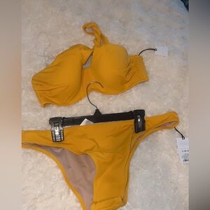 Women’s mustard two piece swimsuit